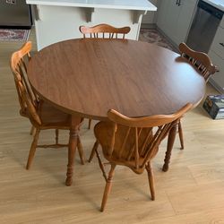 Wooden table with two leafs