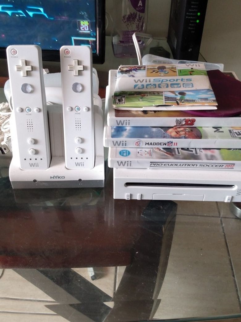 Wii Game System With Two Controllers And 5 Games