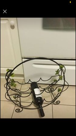 Metal countertop wine rack storage. Holds 6 bottles of wine