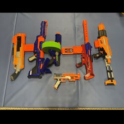 Nerf Guns (6 Manually Operated, 1 Automatic )