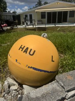 Large yellow mooring buoy