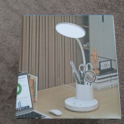 Desk lamp with pen holder