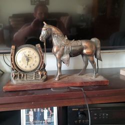 His master caster horse clock