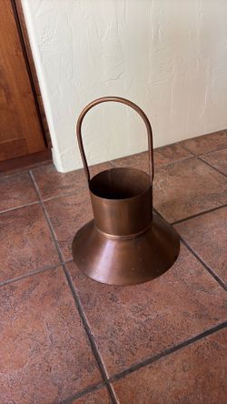 Smith and Hawkins  copper flower  container.