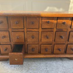 Vintage 18 drawer Apothecary (24W x 13H x 11D Missing one knob) asking 150dlls (Alvernon & Valencia)