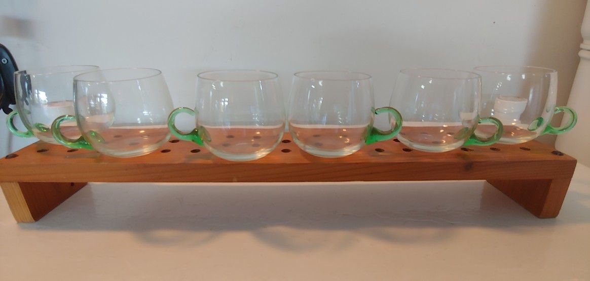 SET OF GREEN GLASS CUPS