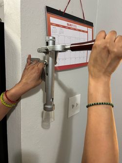 Wall mounted cork screw opener