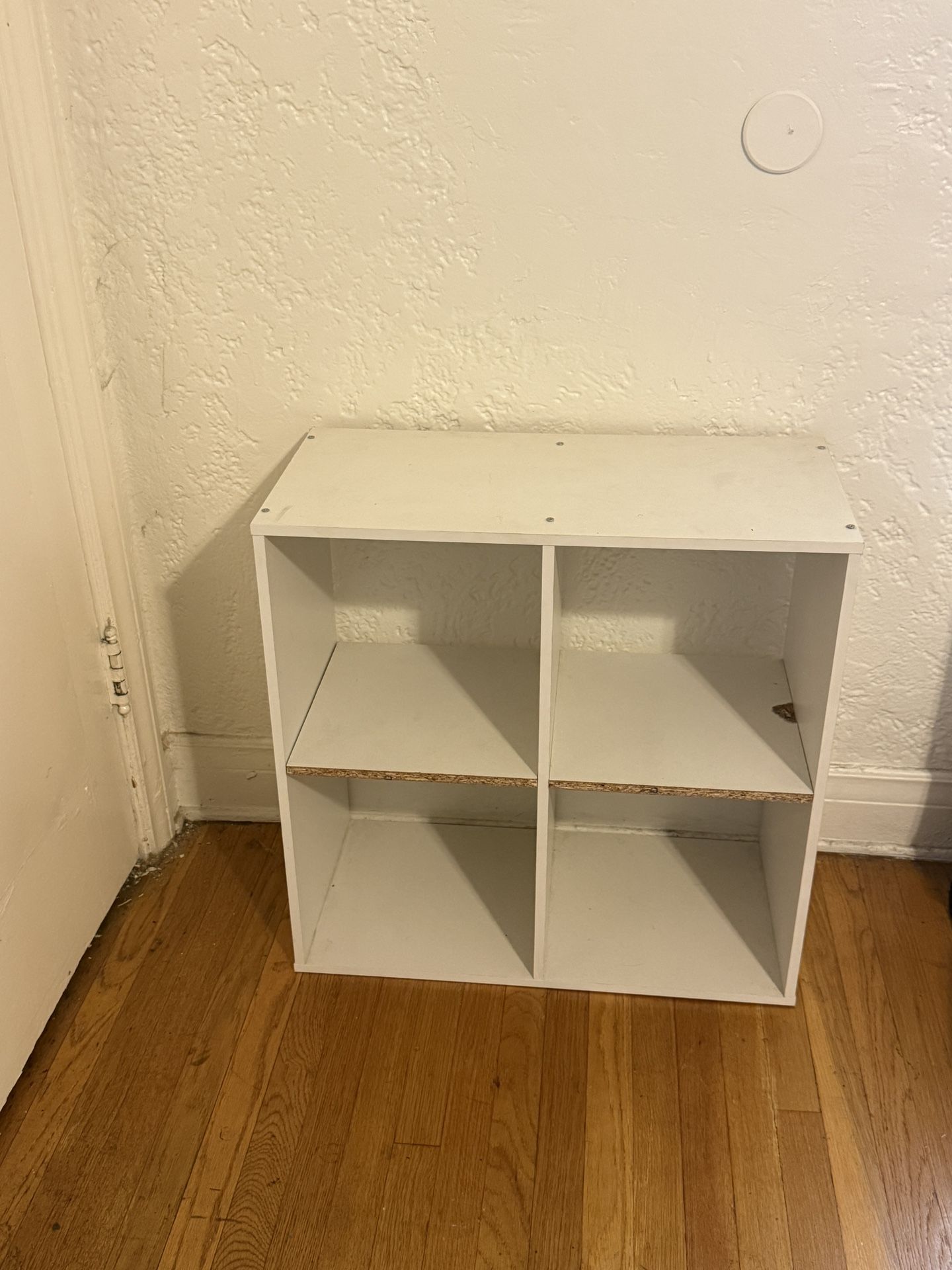 White ikea Shelf For Shoes Or Folded Garments 4 spaces