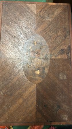 Coffee table with inlay that needs refinishing $20