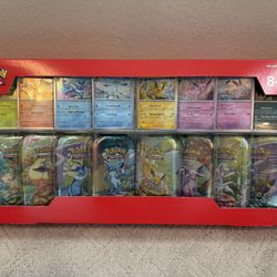  Pokemon Prismatic Evolutions 8-Pack Mini Tins