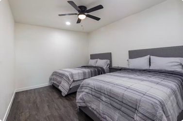 Two full bedrooms  with dresser