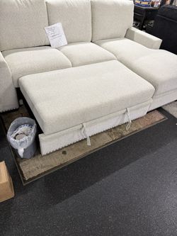 2 Piece Sectional With Pull Out Bed & Storage Chaise On Sale