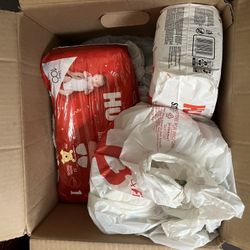 Full Box Filled With Newborn And Size One Diapers 