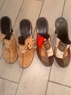 Coach mules with patchwork of brown, beige, and orange leather with repeating beige logo pattern