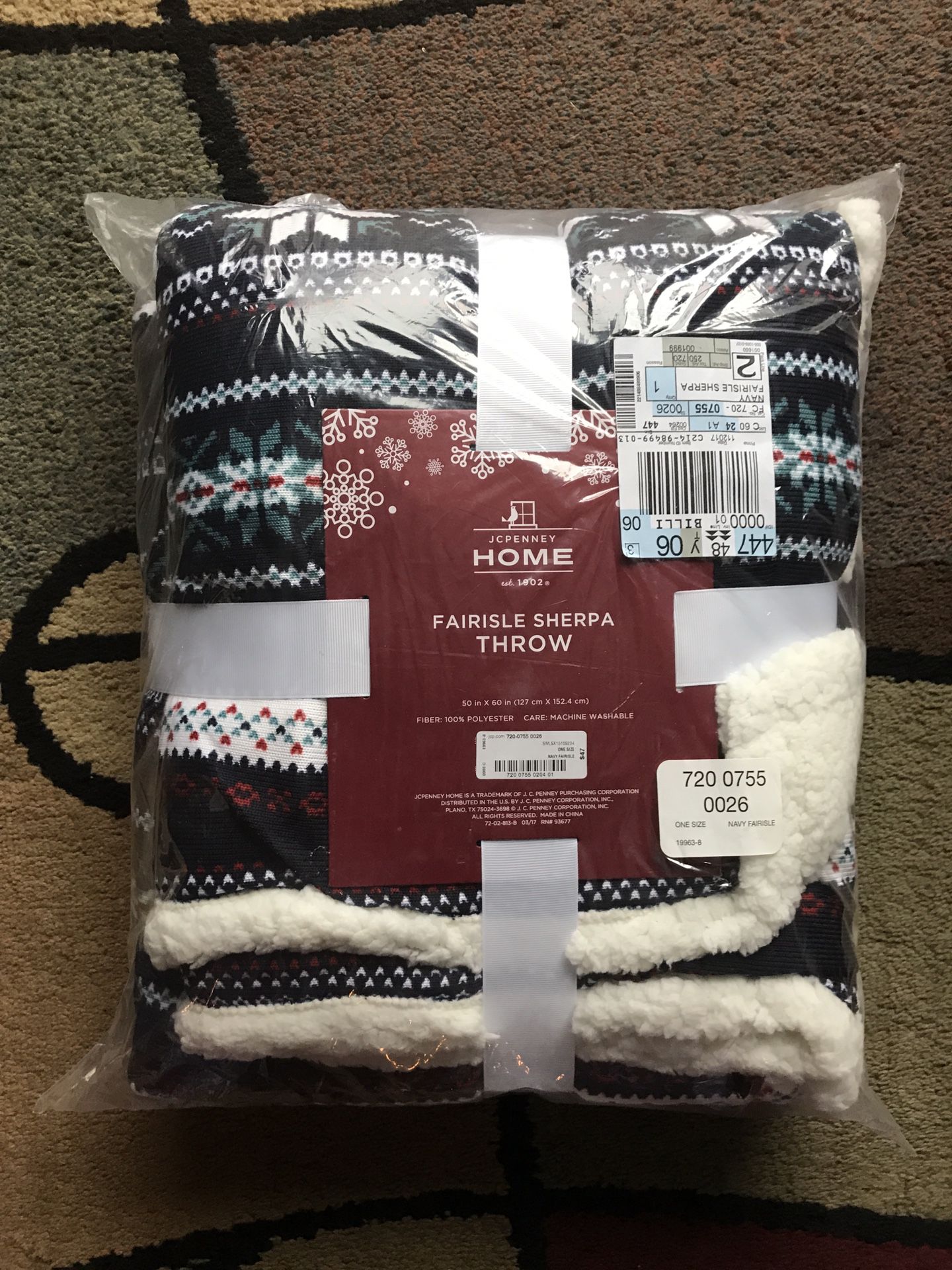 New JCPenney Home Fairisle Sherpa Throw Blanket - This has never even been taken out of plastic from shipping. It is 50” x 60”.