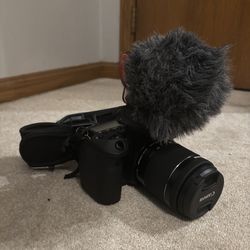 canon 90d with lens and microphone