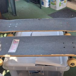 2 complete skateboards and 2 extra decks