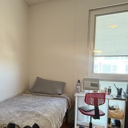 Bed frame, mattress, and desk