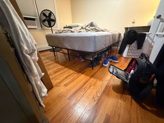Very strong queen size bed frame only . Holds over 450lbs