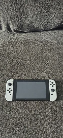 Nintendo Switch with White Joy-Cons