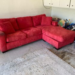 large red L shaped couch 