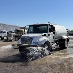 2022 International Water Truck with 2000 Gallon Water Tank. Less Than 6000 Miles/Hose Reel