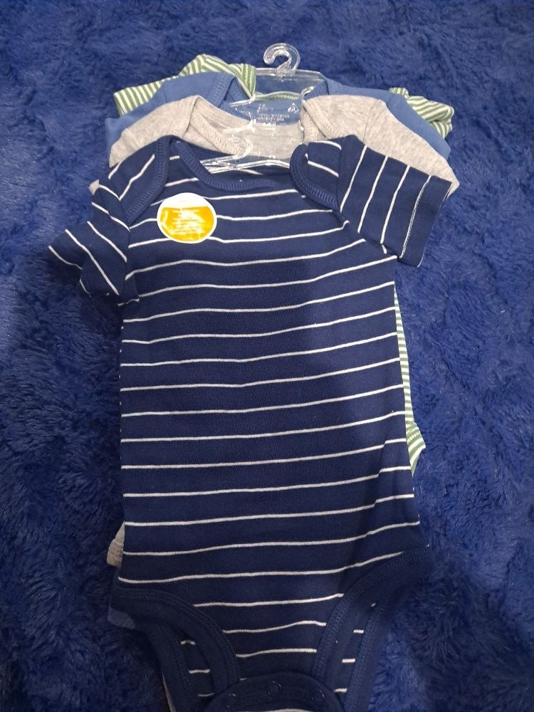  4 Boys Body Suits In A Set .  Baby Soft Cotton For $8