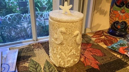 Lidded container for candles