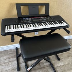 Yamaha Keyboard Piano PSR-E263 with seat and stand