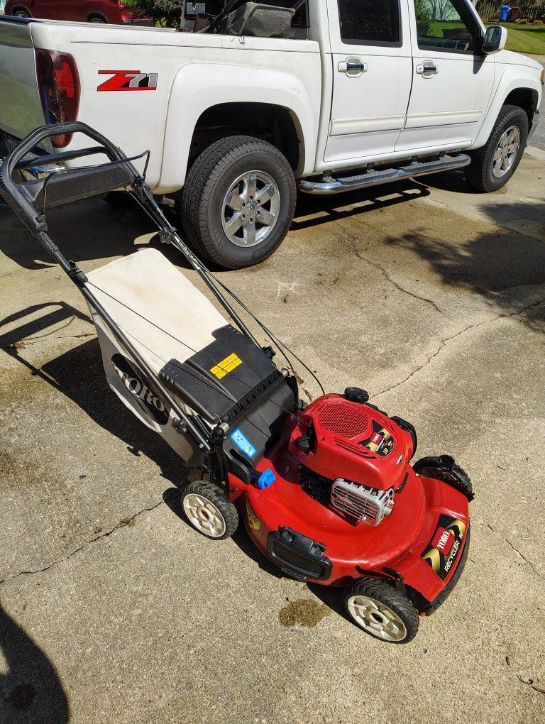 Toro Personal Pace mower 22" cut with bag.