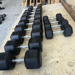New pair of 20,25,30,45,50,55 and 60lb rubber dumbbells NEW IN BOX $570