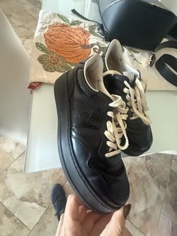 Gucci Embossed Leather Sneakers