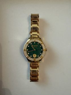 Versace watch gold with emerald face