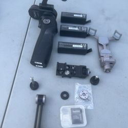 DJI Osmo+ Camera Gimbal Kit w/ 3 Batteries, Rode Video-micro & X5 Lens Adapter. Please note only 2 batteries had enough charge to turn on the gimbal. 
