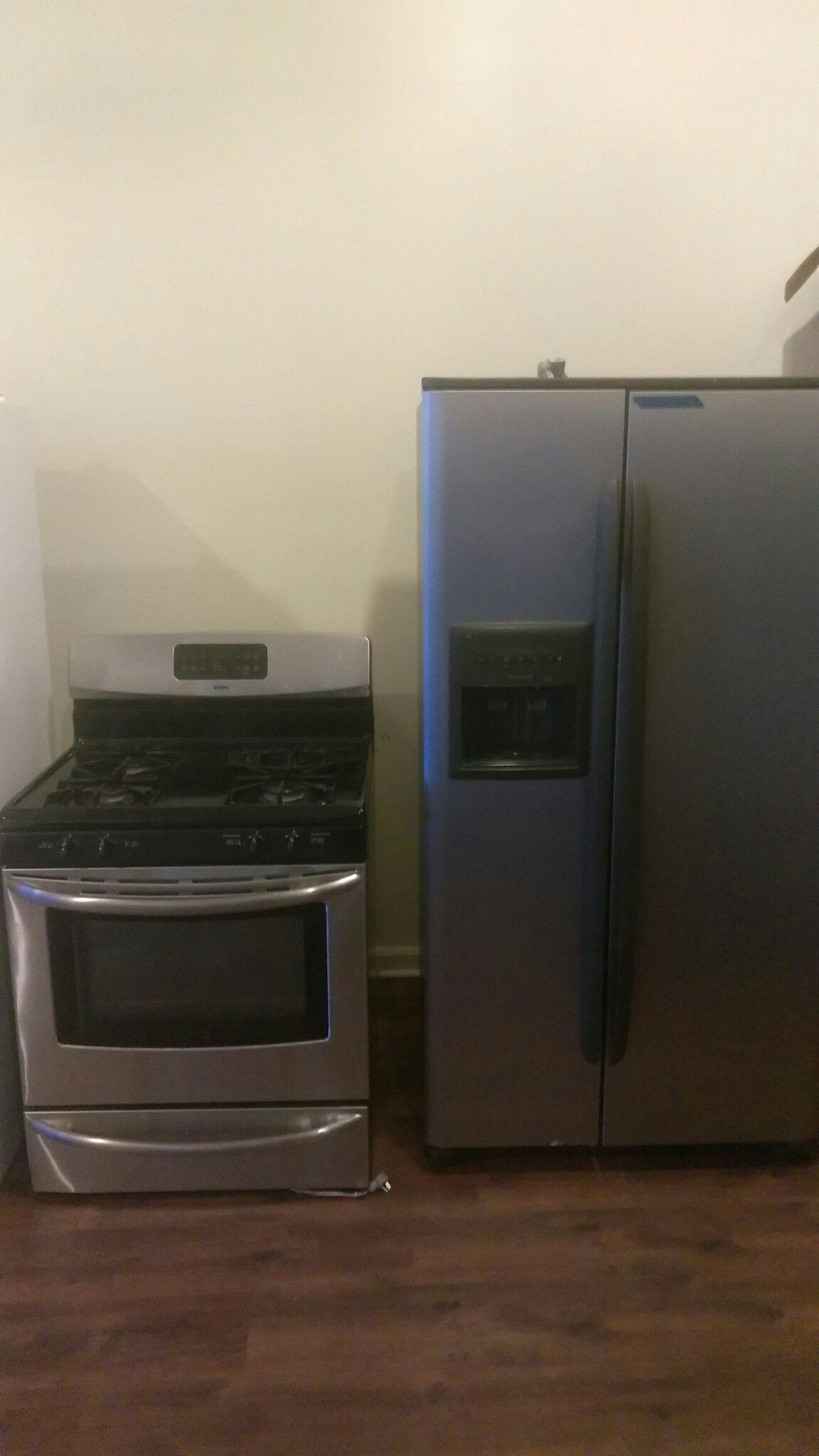 Kenmore stainless steel refrigerator 2-door and stainless steel Kenmore stove
