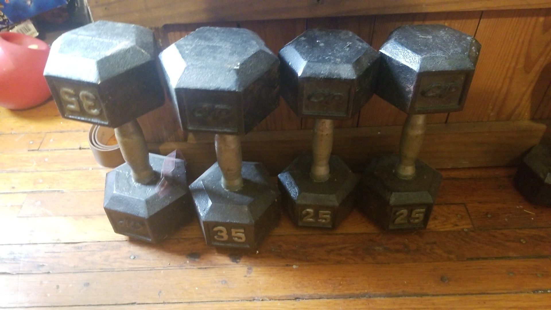 Two pair of dumbbells 25-35 pounds