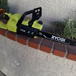 Like New  Ryobi Battery Operated Chain Saw