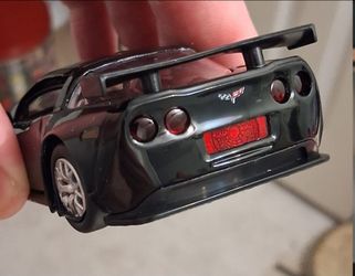 Diecast Chevrolet Corvette C6-R Opening Doors Rubber Tires 1/36 Black LICENSED