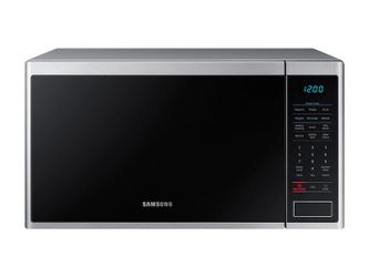 New in box Countertop Microwave 1.4 cu. ft.  with Sensor Cooking in Stainless Steel