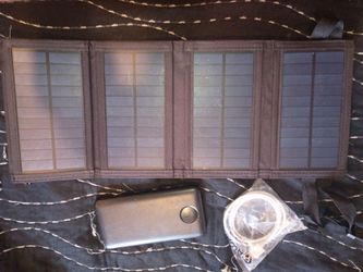 Solar cell phone charger with backup battery