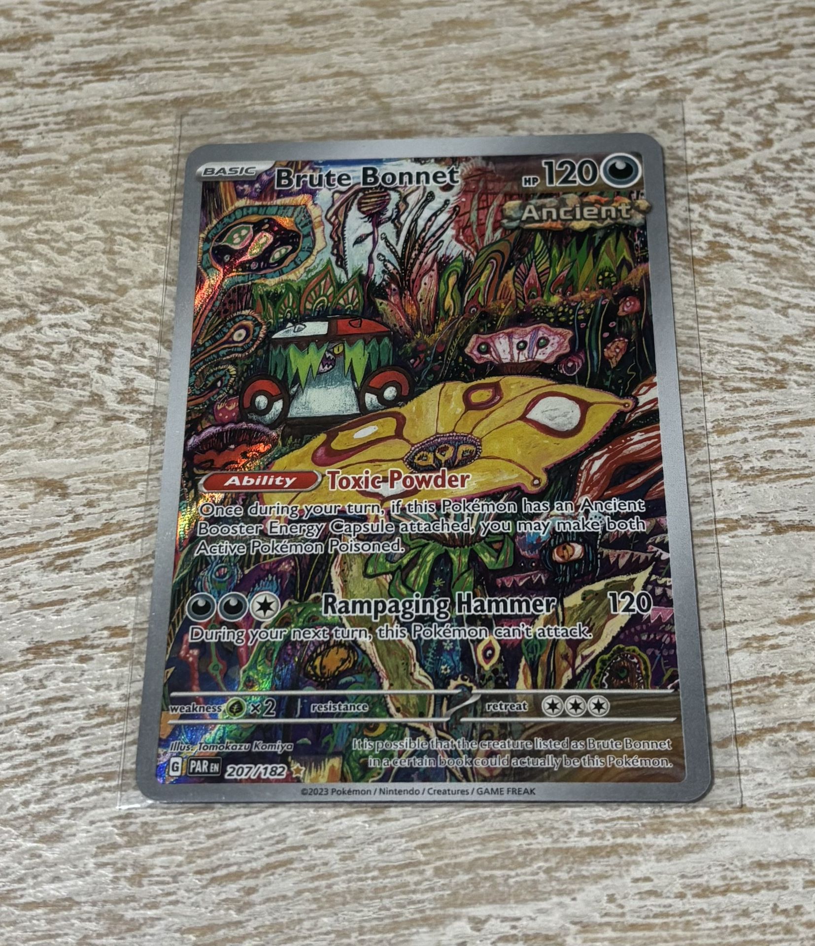 Brute Bonnet 207/182 Sv04: Paradox Rift Holo Pokemon TCG