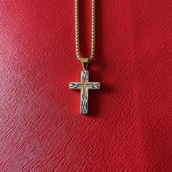 Stainless steel cross pendant with chain.