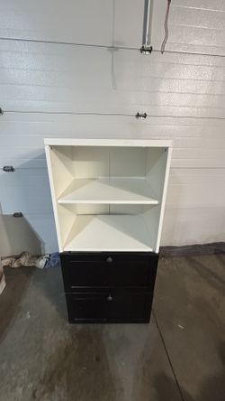 Two tone storage dresser unit 51”T 23.5”L 19.25”D white open 2 shelf top on black 2 drawer cabinet base