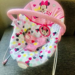 Bright Starts Disney Baby Minnie Mouse Bouncer with Toy bar.