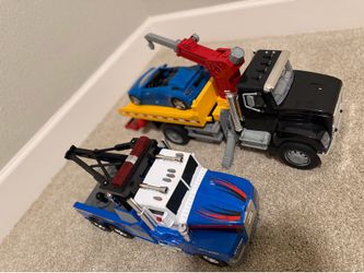 Toy tow truck and city vehicle set