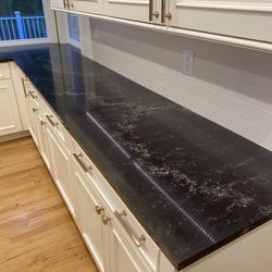 Reclaimed Quartz Countertops & Cast Iron Sink 