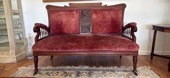 Antique Carved Wood Settee with Red Velvet Upholstery