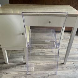 Desk and clear chair