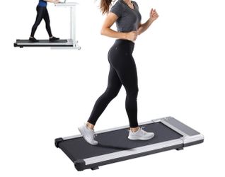 Treadmill — used only once, like new.