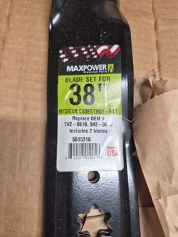 2 38 in. Craftsman mulching blades. Never used